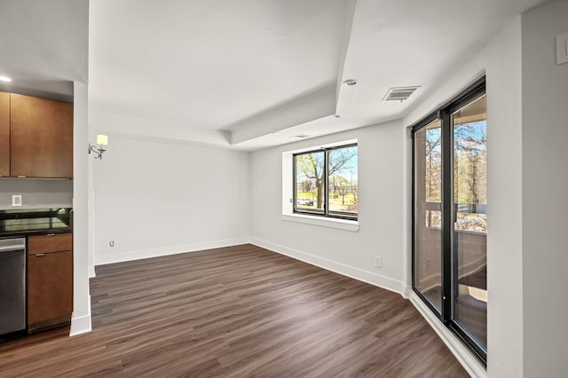 interior space featuring visible vents, recessed lighting, dark wood-style flooring, and baseboards