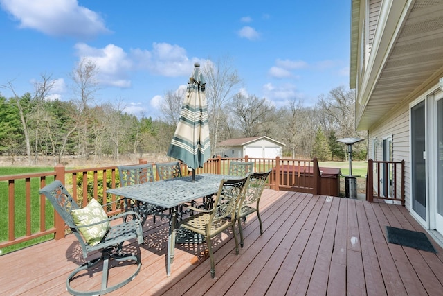 14580 30th St, Clear Lake, MN 55319 - wooden deck with outdoor dining space and a storage shed
