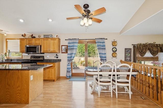 14580 30th St, Clear Lake, MN 55319 - kitchen featuring appliances with stainless steel finishes, light wood-type flooring, ceiling fan, brown cabinetry, and recessed lighting