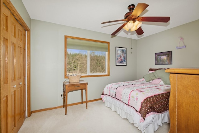 14580 30th St, Clear Lake, MN 55319 - bedroom with light carpet, a closet, and a ceiling fan