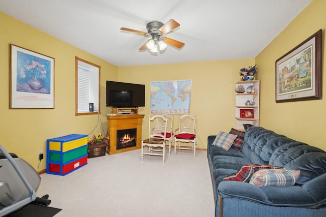 14580 30th St, Clear Lake, MN 55319 - living area featuring ceiling fan, a warm lit fireplace, and carpet
