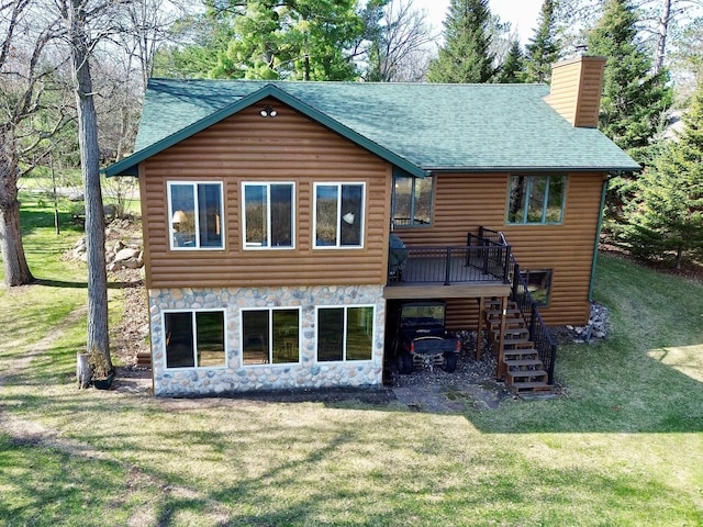 rear view of property featuring stairs, a chimney, a shingled roof, stone siding, and log veneer siding