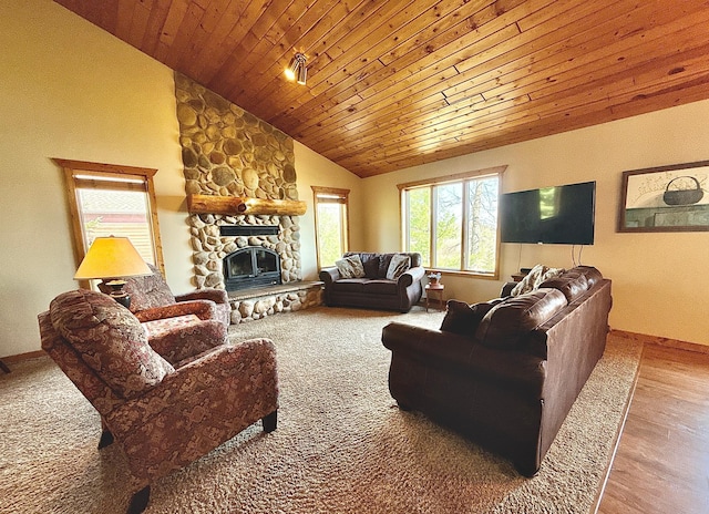 living area featuring vaulted ceiling, a stone fireplace, wooden ceiling, baseboards, and wood finished floors