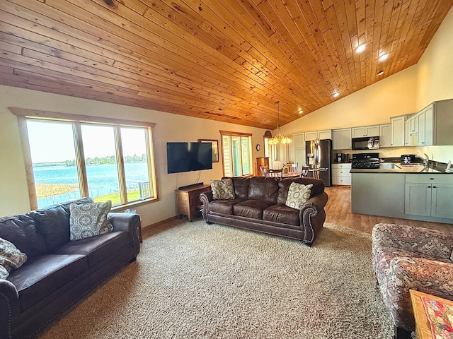 carpeted living area with vaulted ceiling, wood ceiling, and baseboards