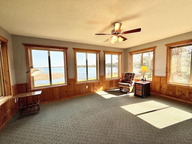 sunroom with a water view