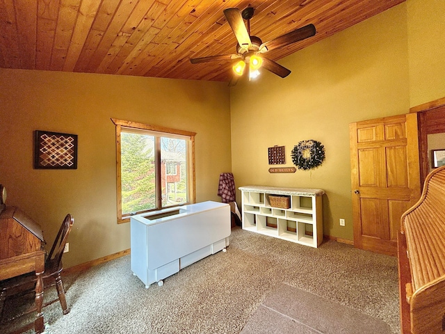 office with vaulted ceiling, carpet flooring, a ceiling fan, wood ceiling, and baseboards