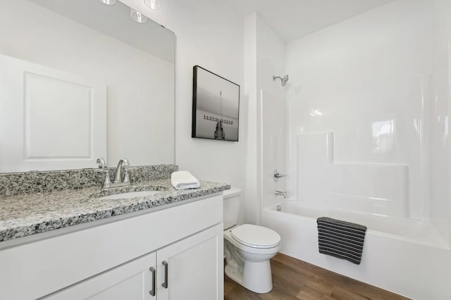 13155 Preserve Cir, Baxter, MN 56425 - full bath featuring vanity, toilet, wood finished floors, and washtub / shower combination