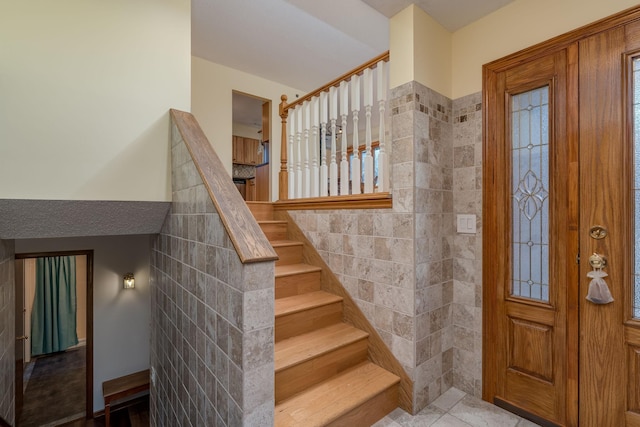 2324 Fair St, Mankato, MN 56001 - foyer entrance with stairs and tile walls
