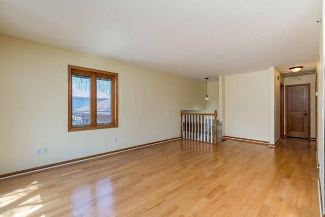 2324 Fair St, Mankato, MN 56001 - empty room with light wood-style floors and baseboards