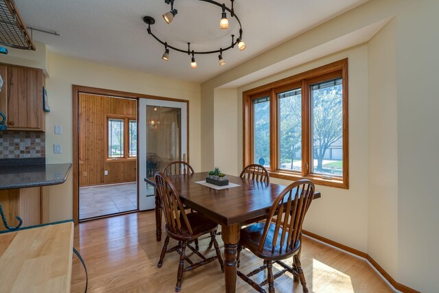 2324 Fair St, Mankato, MN 56001 - dining room featuring baseboards and light wood-style flooring