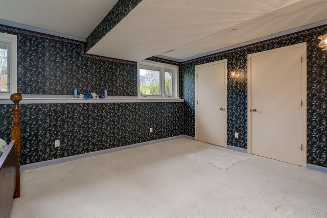 2324 Fair St, Mankato, MN 56001 - carpeted spare room with wallpapered walls
