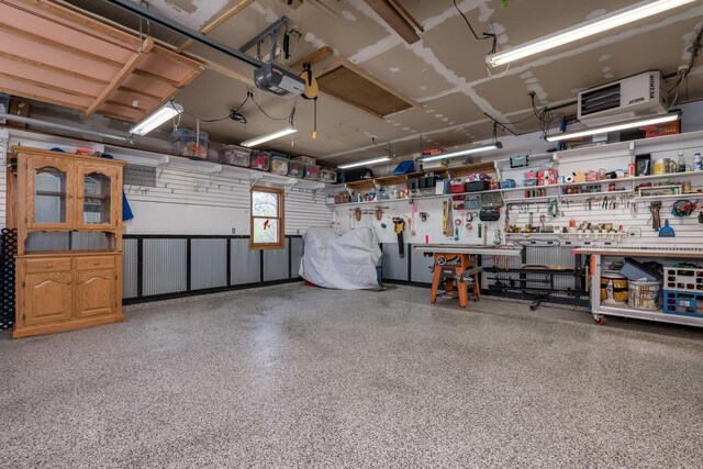2324 Fair St, Mankato, MN 56001 - garage with a workshop area and a garage door opener
