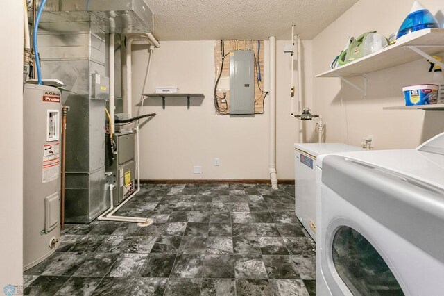 washroom with electric panel, electric water heater, washing machine and dryer, a textured ceiling, and baseboards