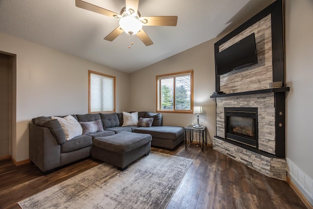 434 Fridell Cres, Red Wing, MN 55066 - living room with lofted ceiling, a stone fireplace, wood finished floors, and a ceiling fan