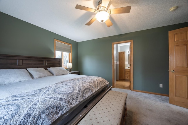 434 Fridell Cres, Red Wing, MN 55066 - bedroom featuring light carpet, baseboards, a ceiling fan, and connected bathroom