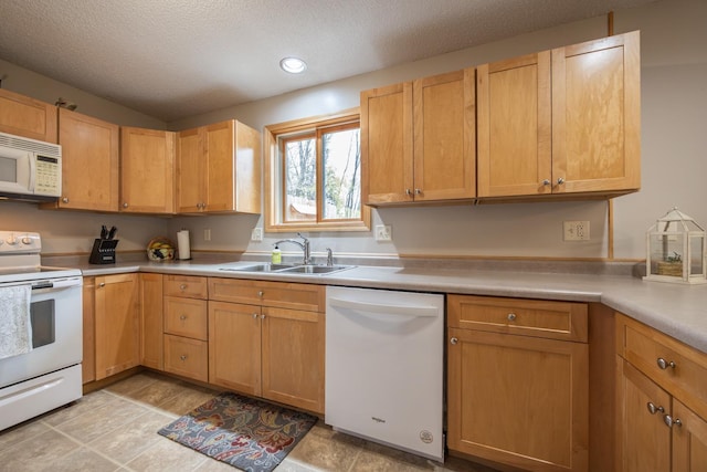 434 Fridell Cres, Red Wing, MN 55066 - kitchen featuring white appliances, a sink, light countertops, a textured ceiling, and recessed lighting