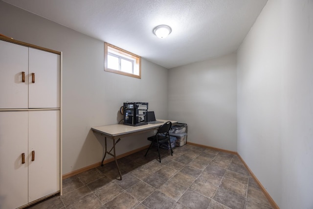 434 Fridell Cres, Red Wing, MN 55066 - office area with baseboards, stone finish floors, and a textured ceiling