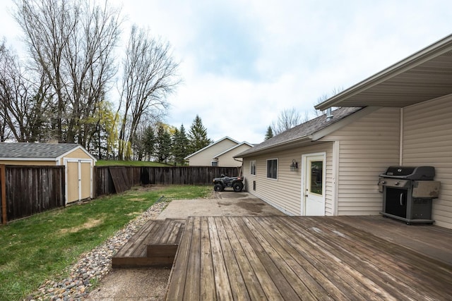 434 Fridell Cres, Red Wing, MN 55066 - wooden terrace featuring area for grilling, a storage unit, and an outbuilding