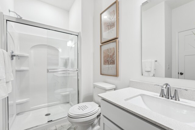 2704 Aspen Dr, Shakopee, MN 55379 - bathroom with toilet, a stall shower, and vanity