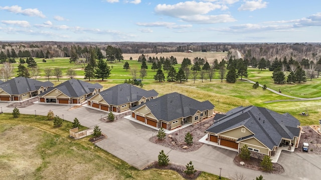 birds eye view of property with a residential view and view of golf course