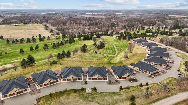 birds eye view of property with a residential view