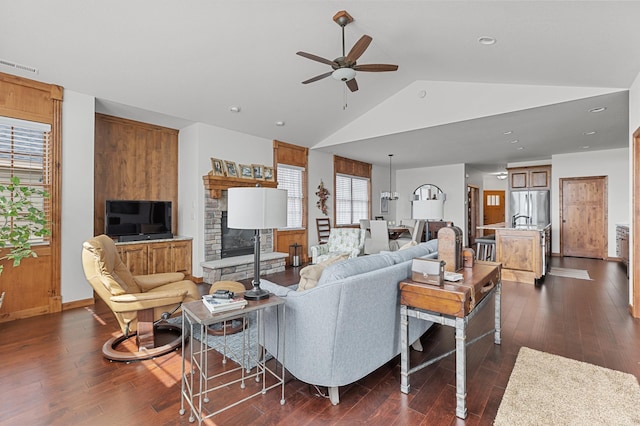 7466 Fairway Ln, Breezy Point, MN 56472 - living room featuring ceiling fan, recessed lighting, dark wood finished floors, a fireplace, and high vaulted ceiling