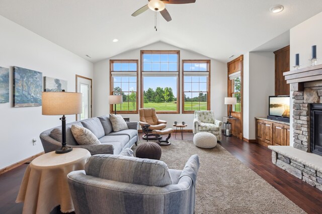 7466 Fairway Ln, Breezy Point, MN 56472 - living area with vaulted ceiling, a stone fireplace, ceiling fan, and dark wood-style flooring