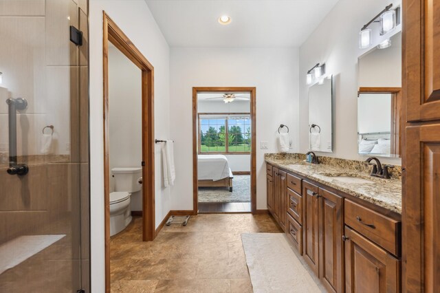 7466 Fairway Ln, Breezy Point, MN 56472 - bathroom featuring double vanity, a stall shower, a ceiling fan, connected bathroom, and recessed lighting