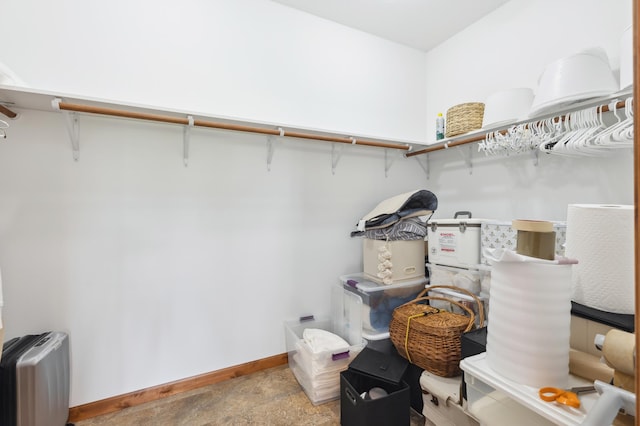 7466 Fairway Ln, Breezy Point, MN 56472 - walk in closet featuring stone finish flooring