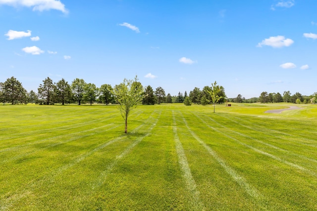 7466 Fairway Ln, Breezy Point, MN 56472 - surrounding community with a lawn and golf course view