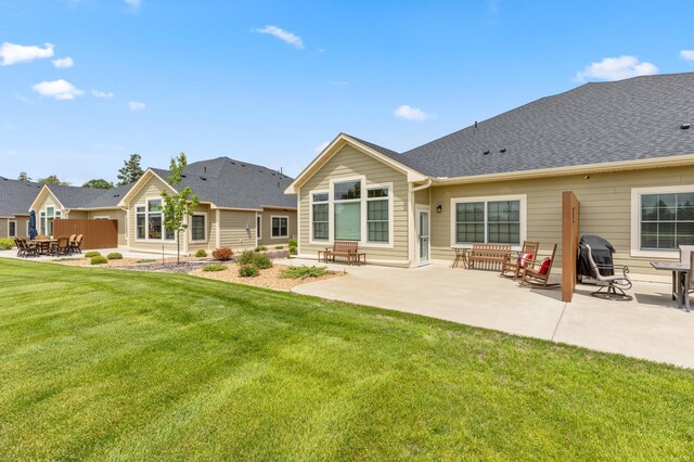 7466 Fairway Ln, Breezy Point, MN 56472 - back of property with a yard and a patio