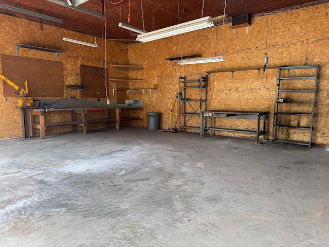 garage featuring a workshop area