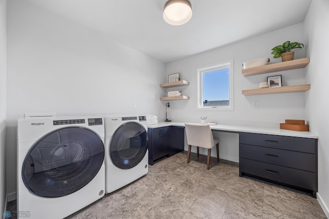 laundry room featuring cabinet space and washer and dryer