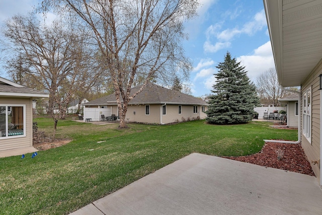215 Butler St, Litchfield, MN 55355 - view of green lawn featuring a patio