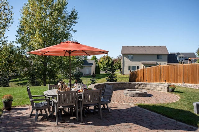 19717 Hazel Nut Ave, Lakeville, MN 55044 - view of patio / terrace with an outdoor fire pit