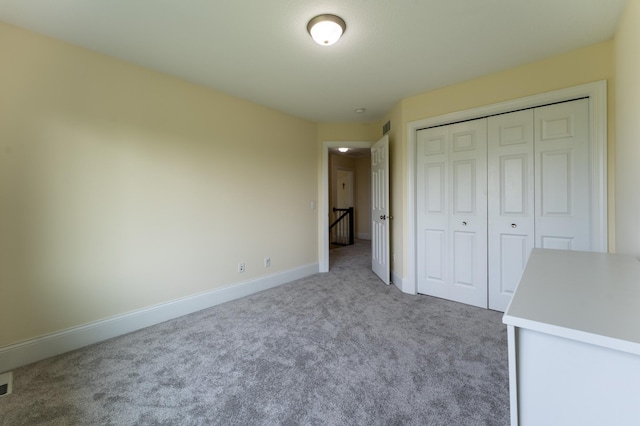 19717 Hazel Nut Ave, Lakeville, MN 55044 - unfurnished bedroom featuring carpet flooring, baseboards, and a closet