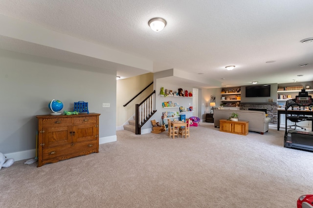19717 Hazel Nut Ave, Lakeville, MN 55044 - playroom with carpet flooring, a textured ceiling, and baseboards
