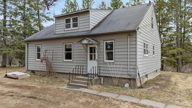 37301 Little Sweden Rd, Nashwauk Twp, MN 55769 - bungalow-style house with entry steps and roof with shingles