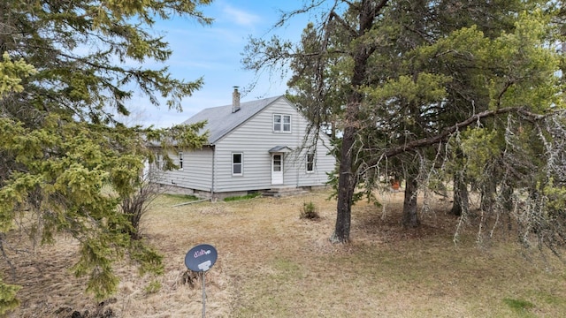 37301 Little Sweden Rd, Nashwauk Twp, MN 55769 - view of side of property with a chimney