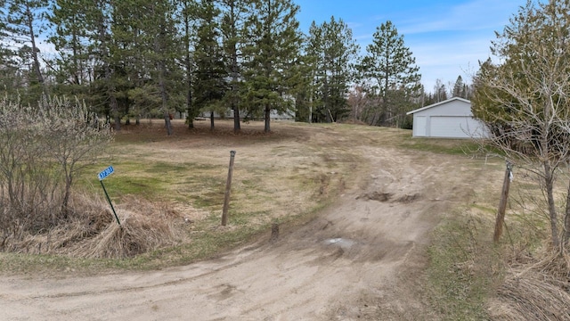 37301 Little Sweden Rd, Nashwauk Twp, MN 55769 - view of yard with an outbuilding and a garage