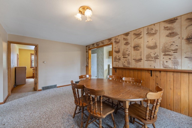 37301 Little Sweden Rd, Nashwauk Twp, MN 55769 - dining area featuring carpet floors, baseboards, and visible vents