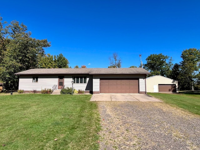 777 Big Round Ave, Georgetown Twp, WI 54853 - single story home with a garage, a front lawn, driveway, and entry steps