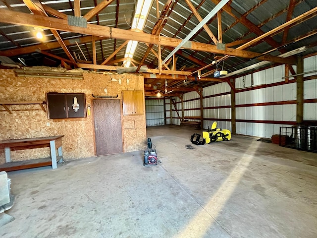 777 Big Round Ave, Georgetown Twp, WI 54853 - garage featuring a garage door opener