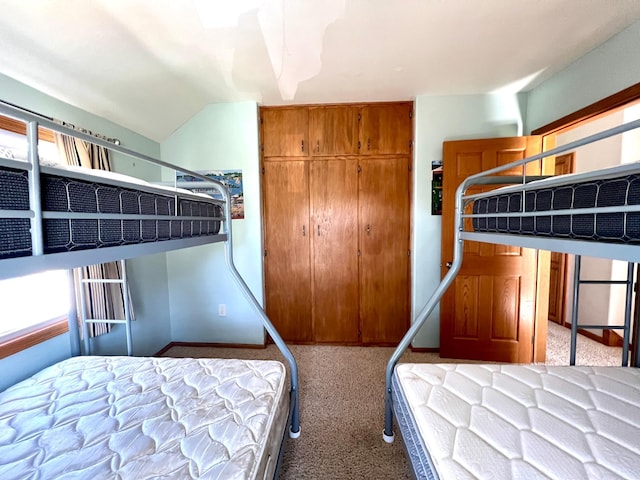 bedroom with carpet flooring and a closet
