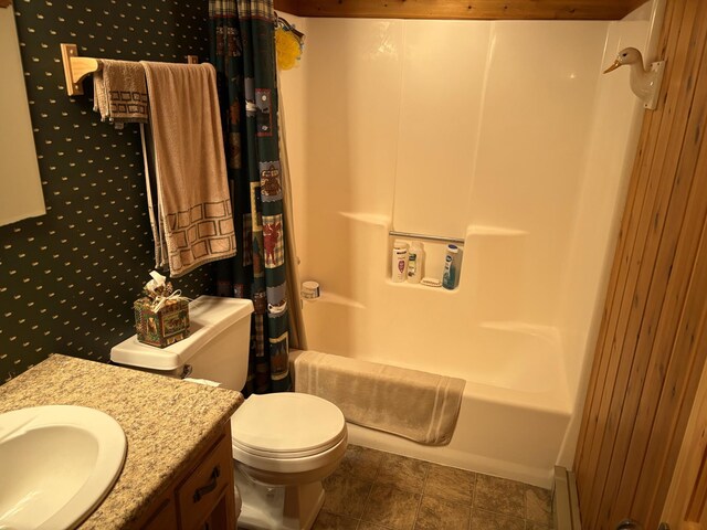 bathroom with toilet, shower / bath combo with shower curtain, and vanity