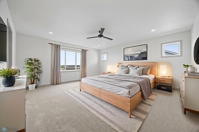 8343 61st St S, Horace, ND 58047 - bedroom featuring multiple windows, light colored carpet, recessed lighting, and ceiling fan