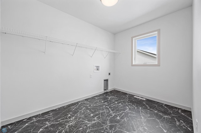 8343 61st St S, Horace, ND 58047 - washroom with dark marble finish floors, hookup for a washing machine, and electric dryer hookup