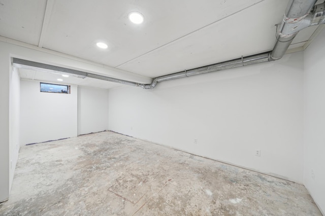 basement featuring recessed lighting