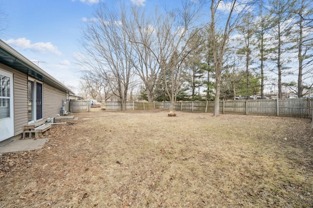view of yard with a fenced backyard