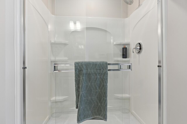 full bathroom with a stall shower